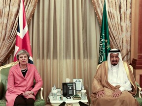 Theresa May, U.K. prime minister, left, looks on during her meeting with King Salman bin Abdulaziz, Saudi Arabia's king, at Al-Yamamah Palace in Riyadh, Saudi Arabia, on April 5, 2017.