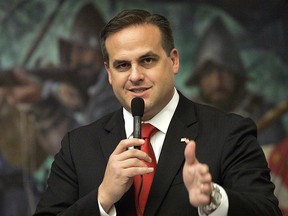 This March 9, 2012, file photo shows Republican state senator Frank Artiles, R-Miami, asking a questions about a pip insurance bill during house session in Tallahassee, Fla.