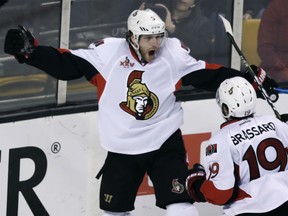 Bobby Ryan is congratulated by Ottawa Senators teammate Derick Brassard after his goal during the third period of Game 4 of their first-round NHL playoff series in Boston on Wednesday night.