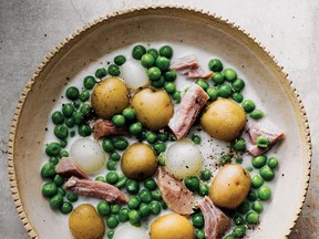 "This little piggy pot is both hearty and spring-fresh with new potatoes and peas," Lundy writes.