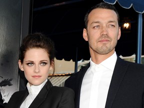 Kristen Stewart (L) and director Rupert Sanders arrive at a screening of Universal Pictures' "Snow White and The Huntsman" at the Village Theatre on May 29, 2012 in Los Angeles, California.