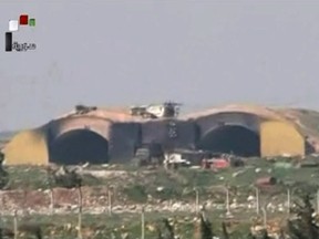 Burned and damaged hangar attacked by U.S. Tomahawk missiles, at the Shayrat Syrian government forces airbase, southeast of Homs, Syria, early Friday April, 7, 2017.