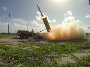 A photo released by the U.S. Department of Defense shows a missile being launched from a Terminal High Altitude Area Defence (THAAD) system on Wake Island in the Pacific Ocean in a test on Nov. 1, 2015.