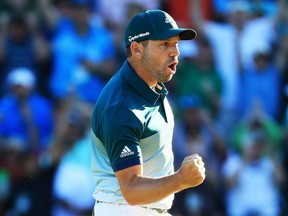 Sergio Garcia celebrates his putt for eagle on the 15th hole at the Masters on April 9.