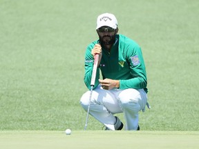 Adam Hadwin lines up his putt on the second hole during the second round of the 2017 Masters Tournament at Augusta National Golf Club on April 7, 2017 in Augusta, Georgia.