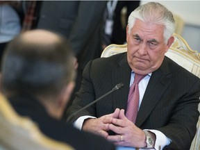 US Secretary of State Rex Tillerson listens, right, to Russian Foreign Minister Sergey Lavrov, back to a camera, during their meeting in Moscow, Russia, Wednesday, April 12, 2017.