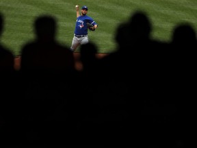 Starting pitcher Marco Estrada works in the first inning against the Baltimore Orioles on April 3.