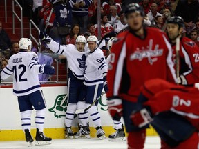 Toronto Maple Leafs players celebrate a James van Riemsdyk goal against the Washington Capitals on April 15.