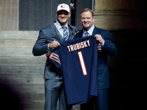 Quarterback Mitchell Trubisky, left, of North Carolina holds up his Chicago Bears jersey with NFL Commissioner Roger Goodell after being taken No. 2 overall in the first round of the NFL draft Thursday night in Philadelphia.