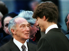 Pierre Trudeau with his eldest son Justin after memorial service for son Michel, who was killed in a B.C. avalanche in 1998.
