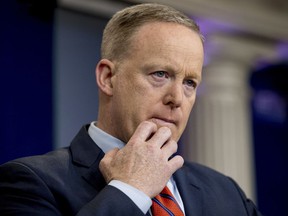 White House press secretary Sean Spicer pauses while talking to the media during the daily press briefing at the White House in Washington, Tuesday, April 11, 2017