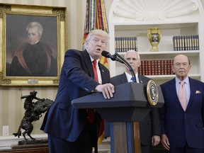 U.S. President Donald Trump speaks before signing an executive order regarding trade in the Oval Office of the White House in Washington, D.C., U.S., March 31, 2017. Trump†ordered on Friday a comprehensive study to identify every form of "trade abuse" that contributes to U.S. deficits with foreign countries.