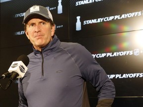 Toronto Maple Leafs head coach Mike Babcock speaks to media at the Air Canada Centre this week. His apparent decision to forsake Buffalo for Toronto rumbled into view again Thursday when the Sabres fired their coach and GM.