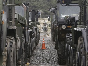 In this April 11, 2017 file photo, U.S. Marine soldiers patrol during the U.S.-South Korea joint Exercise Operation Pacific Reach in Pohang, South Korea. The Trump administration has settled on its North Korea strategy after a two-month review: "Maximum pressure and engagement."