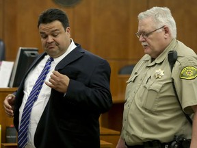 Keith Vallejo leaves the courtroom, in Provo, Utah March 30, 2017. A Utah judge sentencing the former Mormon bishop said the convicted rapist was an "extraordinary, good man" who did something wrong.