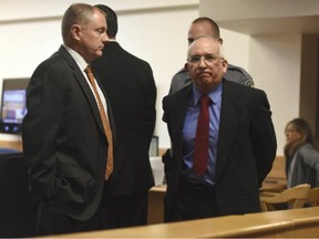 John Sandoval is escorted out of the courtroom after pleading guilty to second-degree murder at the Weld County Courthouse in Greeley, Colo., March 31, 2017.