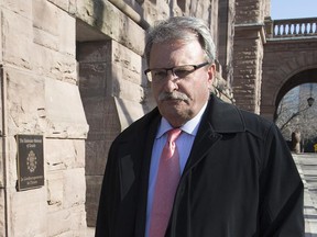 MPP JacK MacLaren leaves  his Queen's Park office after avoiding the media about his website in Toronto, Ont. on Wednesday April 13, 2016.