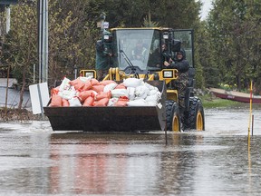 More sandbags being delivered along Voisine Road as flooding continues in Rockland, Ontario. May 5,2017.