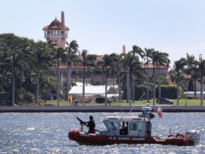 A Coast Guard boat is seen patrolling in front of the Mar-a-Lago Resort where President Donald Trump held meetings with Chinese President Xi Jinping on April 7, 2017
