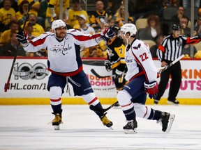 Kevin Shattenkirk (right) celebrates his overtime goal against the Pittsburgh Penguins on May 1.