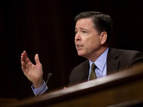 Director of the Federal Bureau of Investigation, James Comey testifies in front of the Senate Judiciary Committee during an oversight hearing on the FBI on Capitol Hill May 3, 201y
