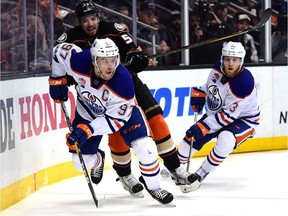 Edmonton Oilers forward Connor McDavid (left) skates away from Anaheim Ducks defenceman Shea Theodore on May 5.