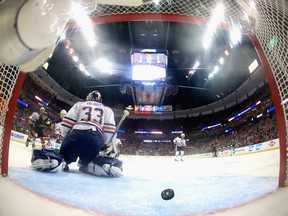 Cam Talbot #33 of the Edmonton Oilers looks on after Nick Ritchie #37 of the Anaheim Ducks scored a goal during the third period  in Game Seven of the Western Conference Second Round during the 2017 NHL Stanley Cup Playoffs at Honda Center on May 10, 2017 in Anaheim, California.