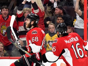 Mike Hoffman celebrates with Ottawa Senators teammate Clarke MacArthur after scoring against the Pittsburgh Penguins on May 23.