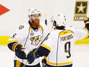 Nashville Predators defenceman Ryan Ellis (left) celebrates his goal against the Pittsburgh Penguins on May 29.