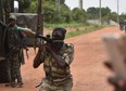 A mutinous soldier holds a RPG rocket launcher inside a military camp in the Ivory Coast's central second city Bouake, on May 15, 2017