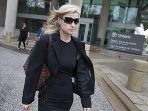 Christina Albini, a former teacher, leaves the Ontario Court of Justice after pleading guilty to sexual interference, Monday, May 1, 2017.