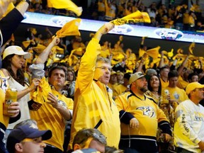 Nashville Predators fans cheer during their team's Game 6 win over the Anaheim Ducks on May 22.