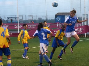 Andrea Gómez, the top scorer for AEM Lleida, heads a ball during a match in Spain in April.