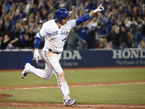 Ryan Goins of the Blue Jays reacts after hitting a game winning RBI single against the Cleveland Indians in the ninth inning of their game in Toronto on Wednesday night.