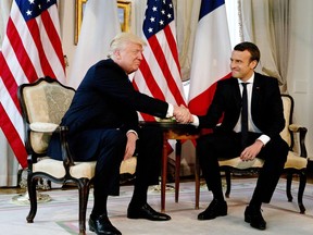 U.S. President Donald Trump meets with French President Emmanuel Macron at the U.S. ambassador's residence in Brussels, Thursday, May 25, 2017. World leaders, including French President Emmanuel Macron and US President Donald Trump are in Belgium to attend a NATO summit.