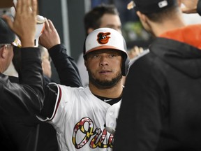 Welington Castillo of the Orioles celebrates his three-run home run against the Toronto Blue Jays in the seventh inning of a their game Saturday night in Baltimore.