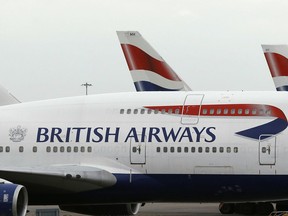In this Tuesday, Jan. 10, 2017 file photo, British Airways planes are parked at Heathrow Airport during a 48hr cabin crew strike in London. Air travelers faced delays Saturday, May 27, 2017 because of a worldwide computer systems failure at British Airways, the airline said.