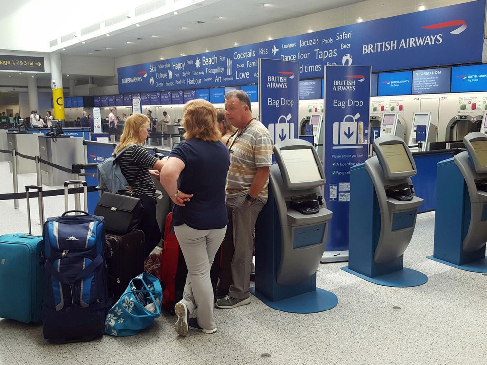 British Airways passengers fuming and waiting in long lines after airline s computer systems went down National Post