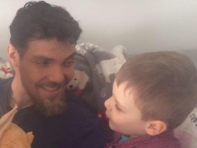 Conor Sykes, 33, shares a moment with his son Liam, 6, in this undated handout photo. RCMP say the bodies of two men and two boys have been recovered following a canoeing accident on a northern Manitoba river. The father and son pair are among the deceased.