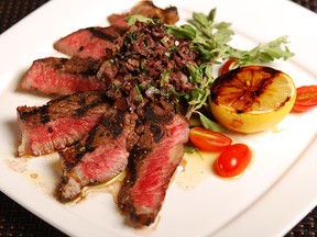 Our homemade olive tapenade adds plenty of flavour to these grilled strip loins.