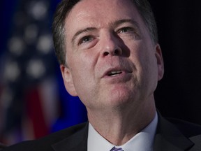 FBI Director James Comey speaks during the Intelligence and National Security Alliance Leadership Dinner in Alexandria, Va.