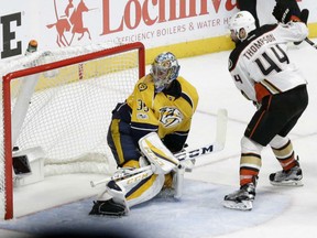 Nate Thompson of the Anaheim Ducks is parked in front of Nashville Predators' goalie Pekka Rinne as the game-winning goal is scored in overtime of Thursday's Game 4 of the Western Conference Final in Nashville. Thompson was given credit for the goal in Anaheim's 3-2 victory, tying the series 2-2 heading back to Anaheim for Game 5 on Saturday.