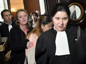 One of the alleged victims arrives to attend the princesses' trial on human trafficking and slavery on May 11, 2017.