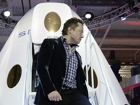SpaceX CEO Elon Musk unveils the company's new manned spacecraft, The Dragon V2, designed to carry astronauts into space