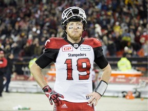 Calgary Stampeders quarterback Bo Levi Mitchell walks off the field at the end of the Grey Cup on Nov. 27, 2016.