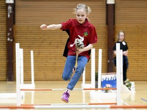 A girl competes during the hobby horsing Finnish championships in Vantaa, Finland, Saturday, April 29, 2017.