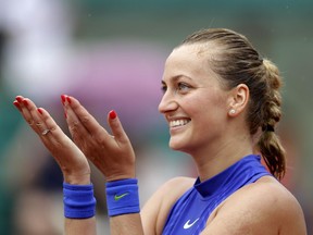 Petra Kvitova thanks the crowd after defeating Julia Boserup at the French Open on May 28.