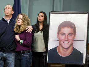 Jim and Evelyn Piazza stand by as District Attorney Stacy Parks Miller announces the results of an investigation into the death of their son Timothy Piazza.