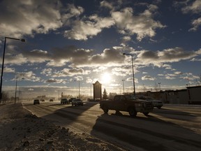 Vehicles approach 34 Avenue in Edmonton, Alberta on Wednesday, January 11, 2017