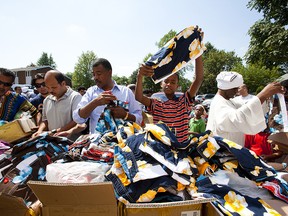 Islamic Relief provided local families children's clothing following afternoon prayers at the Mosque on Aug. 24, 2012.